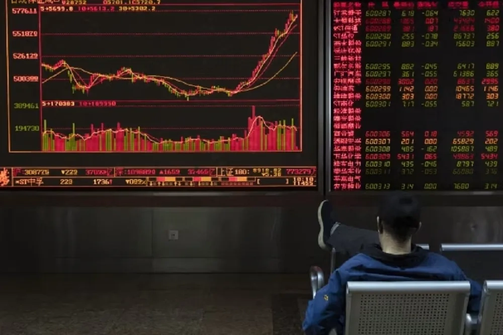 对中国政府来讲,这一波股市热潮最大效益是,暂时转移了众人对银行坏账的关注,但问题依旧没解决。 (资料照片/美联社) 对中国政府来讲,这一波股市热潮最大效益是,暂时转移了众人对银行坏账的关注,但问题依旧没解决。 (资料照片/美联社)