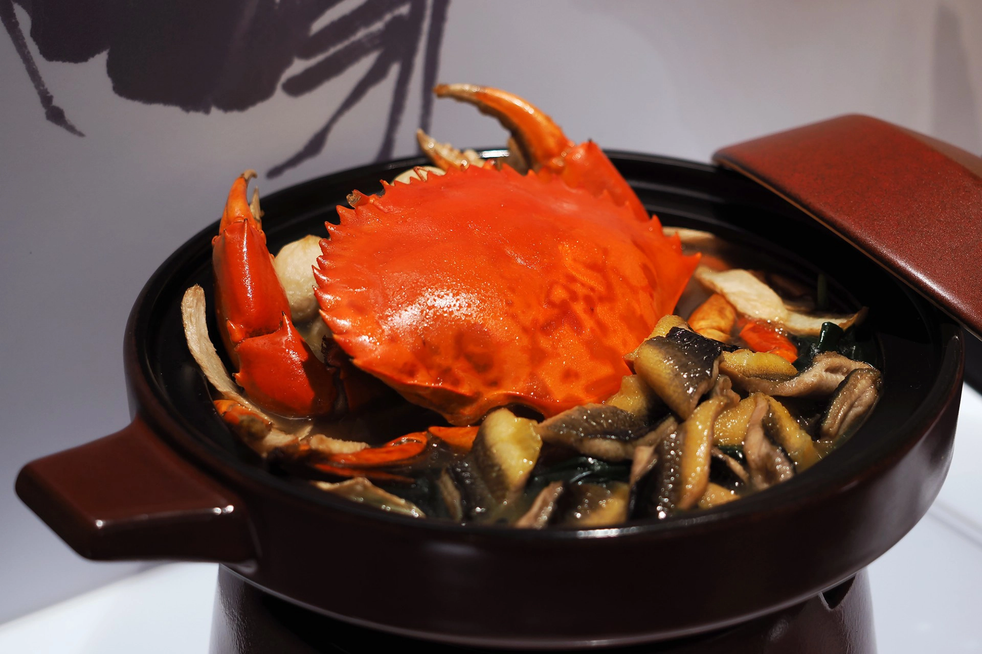 『麻油紅蟳燉生敲』