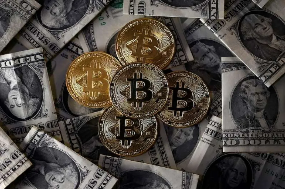 比特幣漲至1萬1000後跌破9500　到底是泡沫還是未來主流？