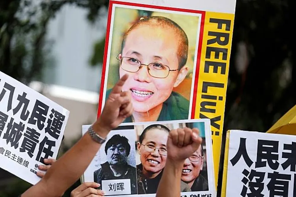 劉曉波遺孀電話錄音檔曝光　「走不掉就死在家裡，死比活容易」