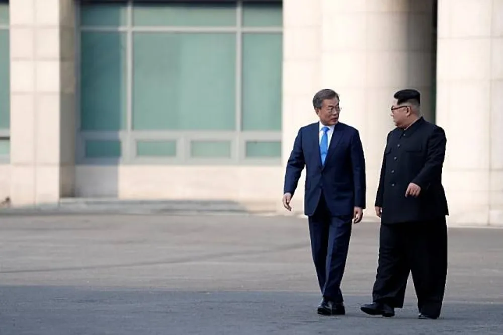 金正恩提「半島無核化」　專家：想想他在核武前露齒笑的畫面