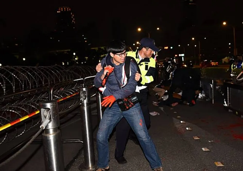總統府跨年夜被潑紅漆　大觀自救會4人被逮
