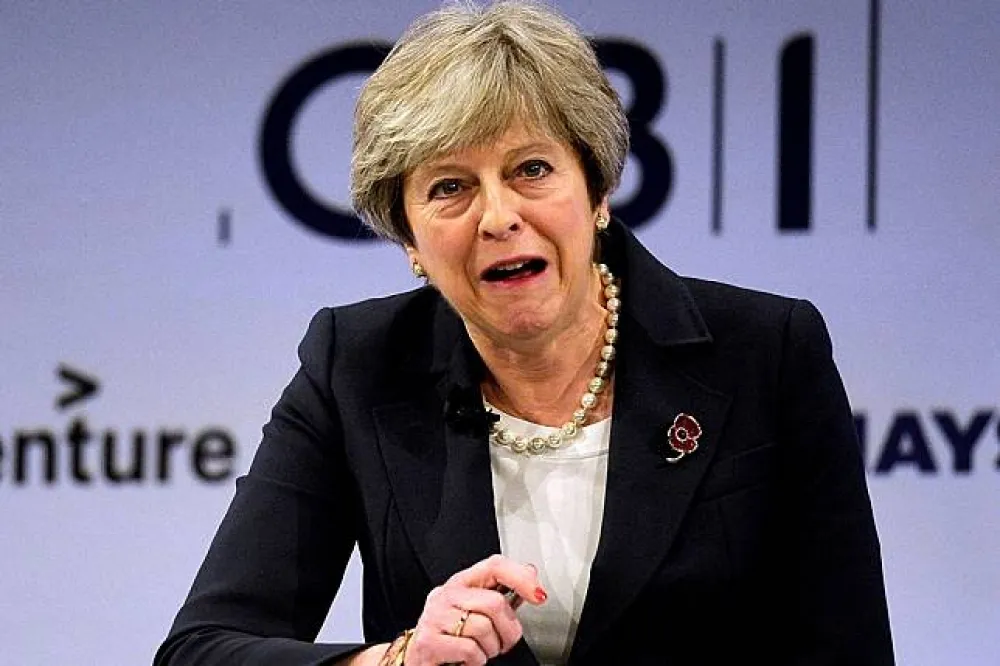 政壇再添紛擾　英國際開發大臣請辭