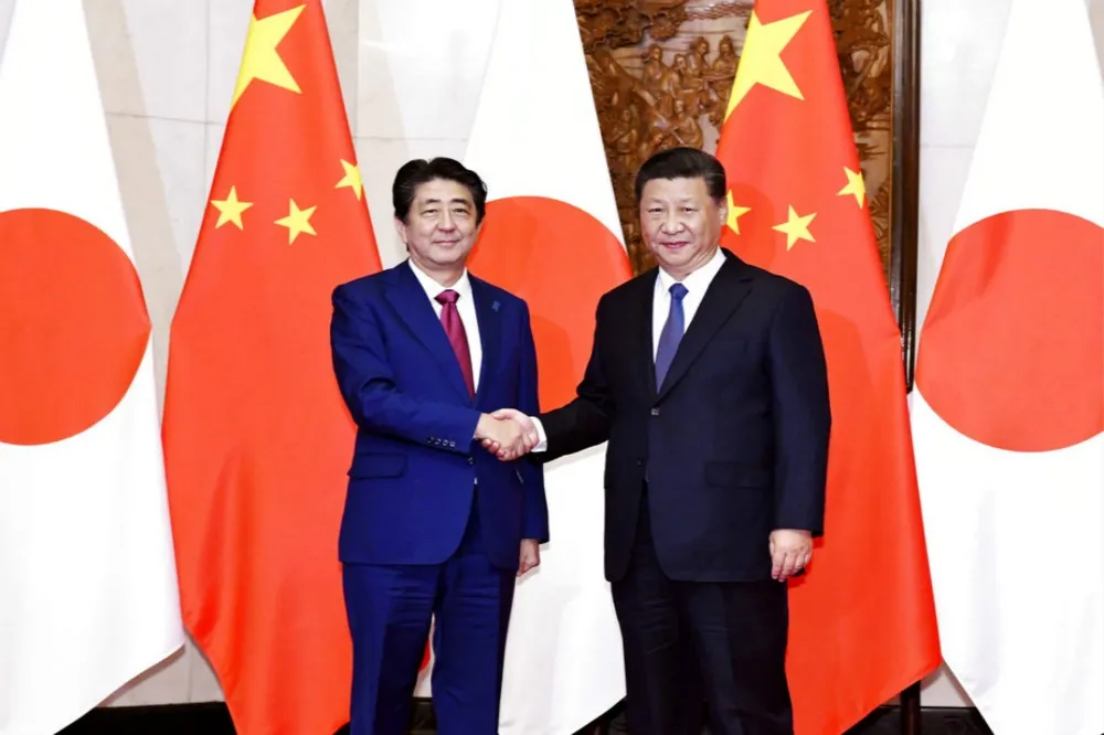 【邀請明年回訪】習近平與安倍「同框」　確立中日經貿與安全合作方向