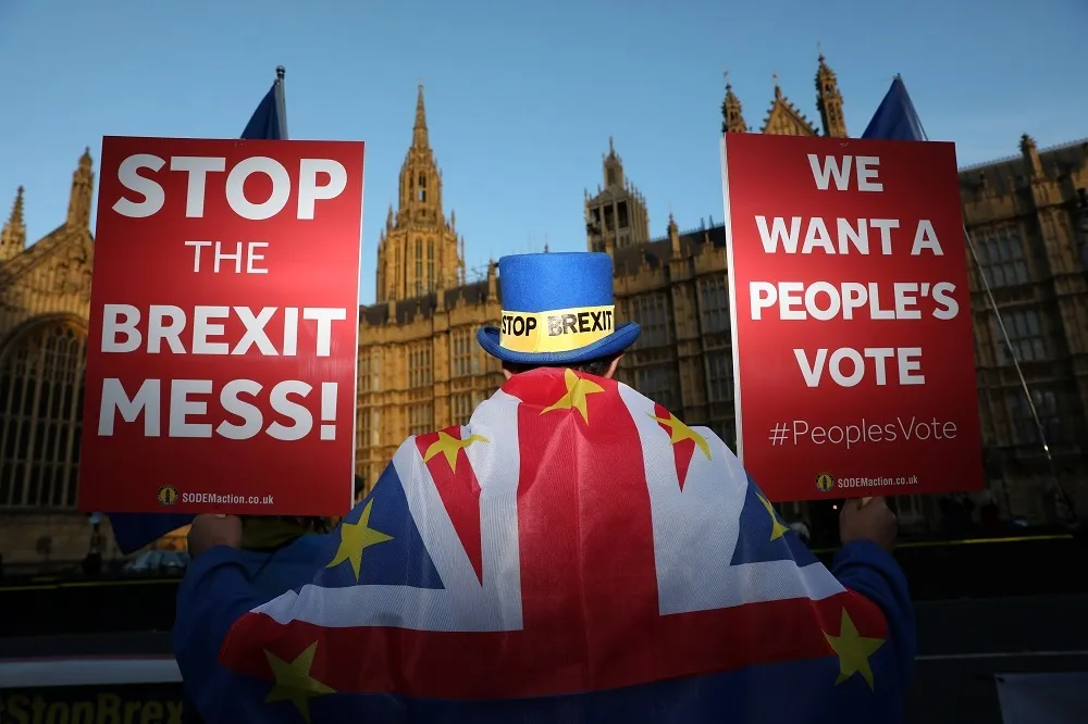 英國脫歐草案與歐盟達協議　執政黨國會不占多數過關難