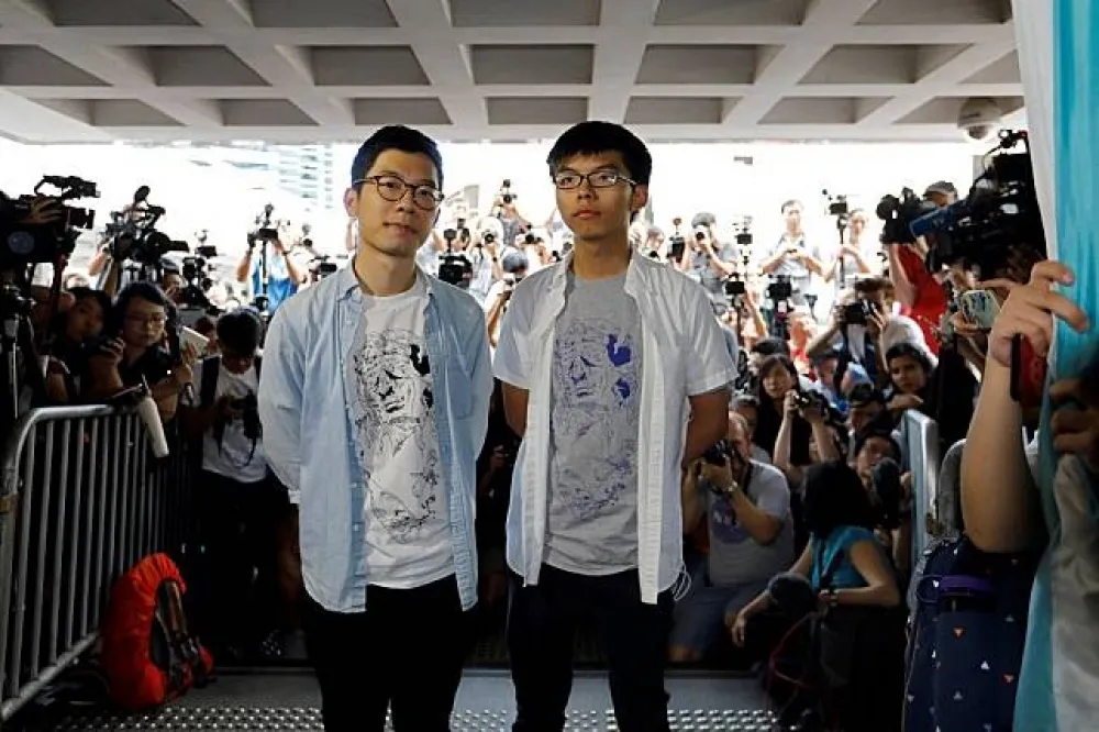 香港重奪公民廣場案判決出爐　黃之鋒等人被改判囚6至8個月