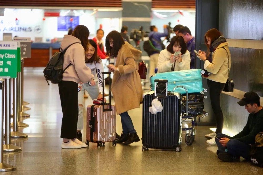 一對港籍表兄妹稱香港航空「有炸彈」　機組緊急疏散檢查