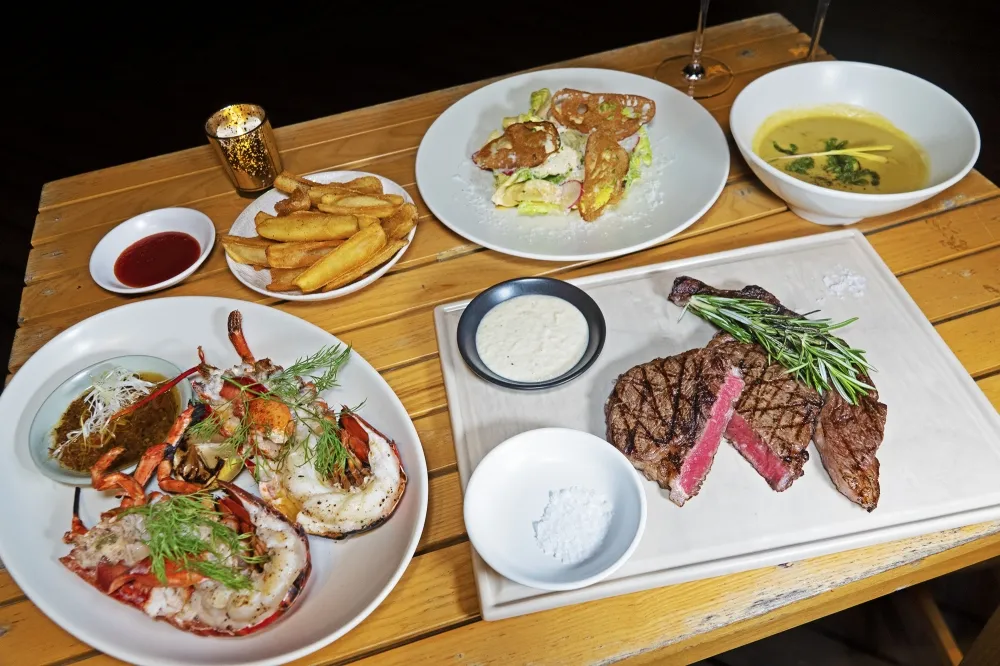 【影片】100元 紅白酒無限暢飲！WILDWOOD 週末宵夜場牛排、龍蝦套餐只要 980 元