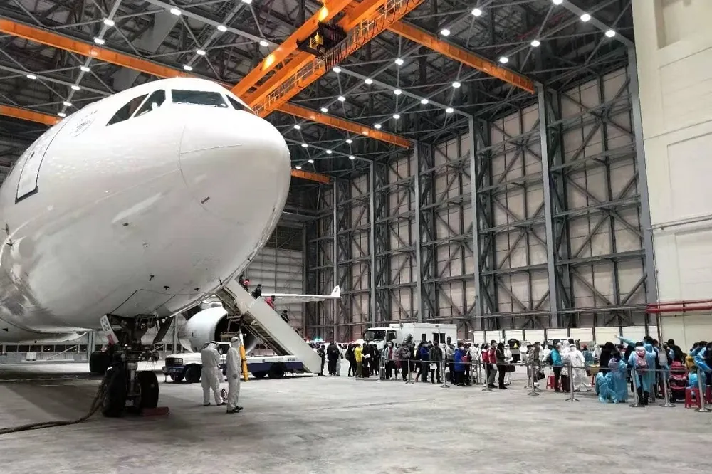 【不管台商死活】中國主導包機撤僑稱不需要防護衣　名單快起飛才丟出