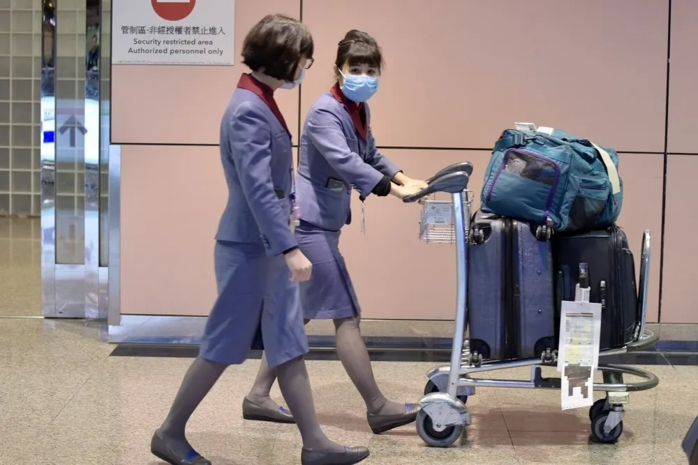 投書：不打疫苗  空服員就該被更嚴格檢疫