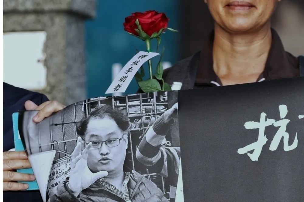 社評：五年了　李明哲還不知能否刑滿出獄