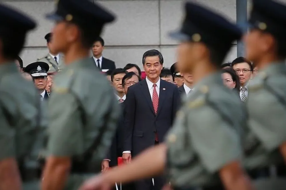 李怡回憶錄：特首豬狼之爭