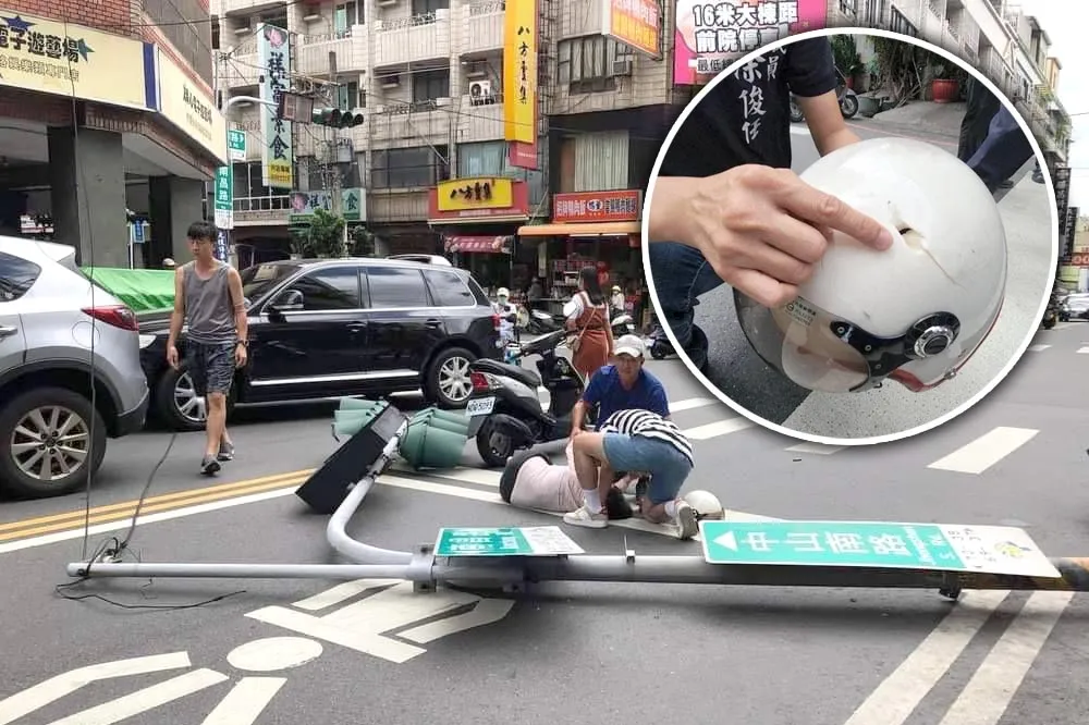 【恐怖片】「軒嵐諾」颳強風！紅綠燈整支遭吹倒　「保命神帽」救婦人一命