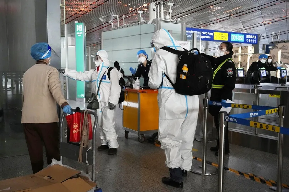 專家估中國14億人口明年上半年染疫將達7億　日本怕爆要求中港澳航班只准在4機場起降