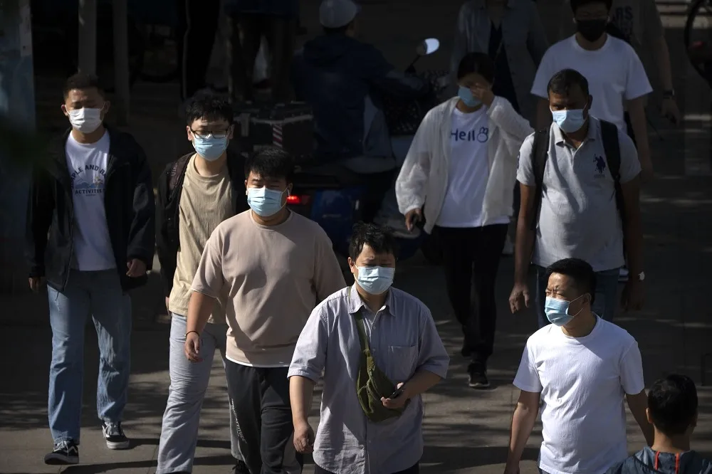 鍾南山：中國6月底料現確診高峰　每周可能有6500萬起確診病例