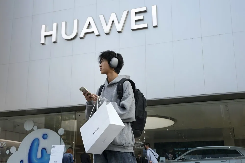 中國手機巨擘華為分配3400億股利　每名員工平均可拿230萬