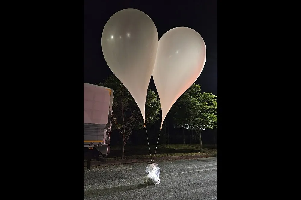 【有片】太噁！北韓空飄逾百「米田共」氣球到南韓