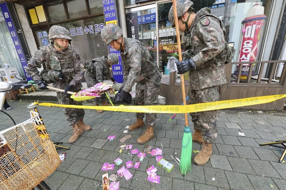 【有片】480顆「穢物氣球」侵入南韓領空　釀成民宅火災 、首度落入總統府禁區