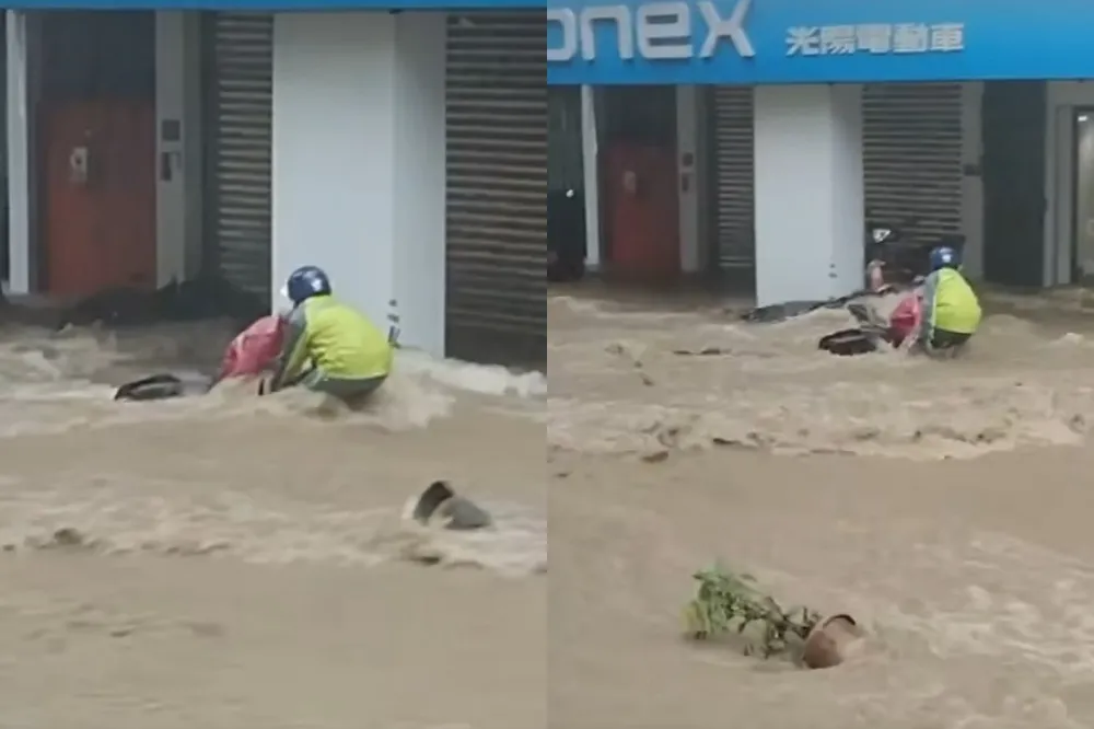 山陀兒瘋狂降雨！女騎士險遭水流沖走　熱心男騎士雨中救援