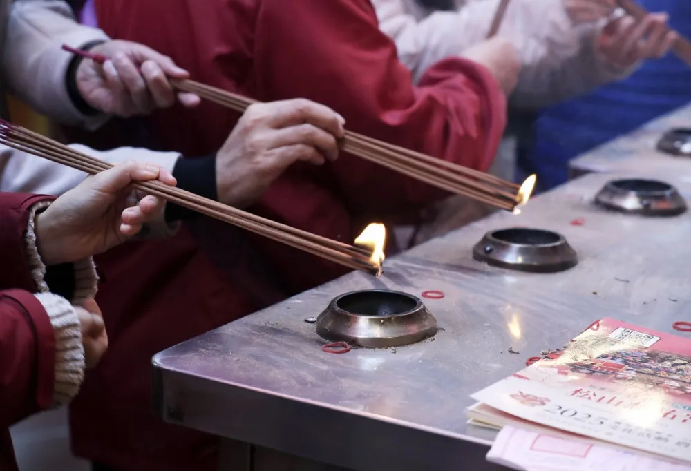 這樣的信徒不是在敬奉神明